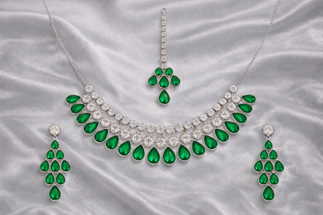 Ikarave Silver Plated Ruby Red Crystal Jewelry Set with Matching Earrings and Maang Tikka for Women, Designer Party Wear Bridal Wedding Fashion Accessories for Festive and Special Occasions